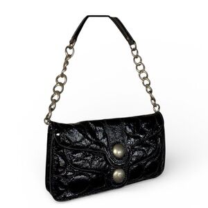 CYNTHIA ROWLEY Black quilted patent leather 'top handle' bag, snaps, pockets.
